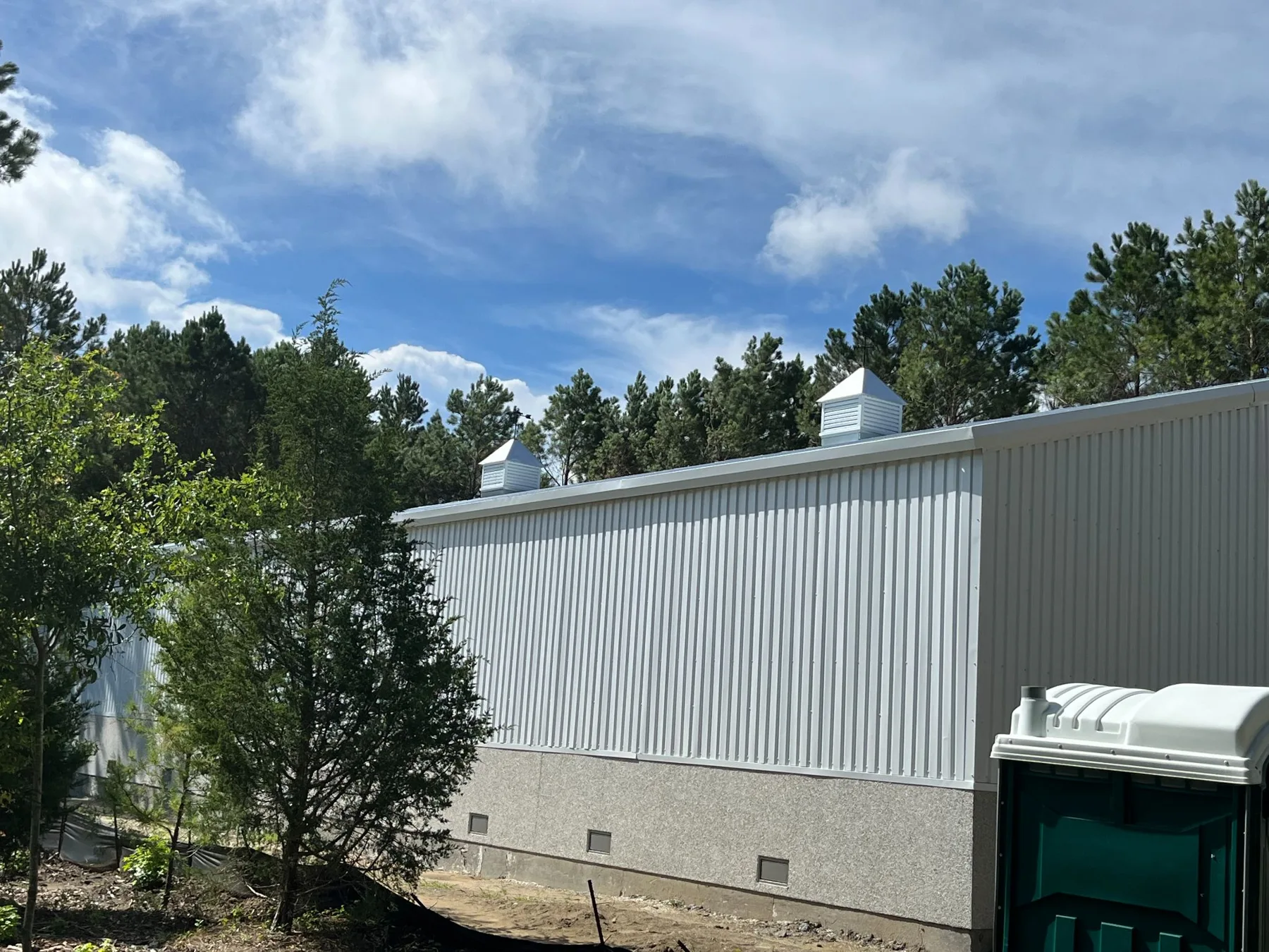 Metal building exterior in its site setting, published on the company website